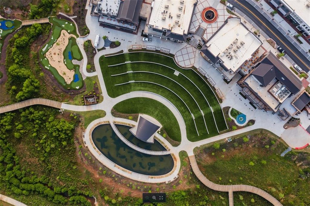 159 Basil Street Cumming, GA 30040 - Photo 68 of 70 an aerial view of a house with garden space and swimming pool