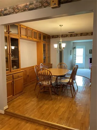 a view of a dining room with furniture