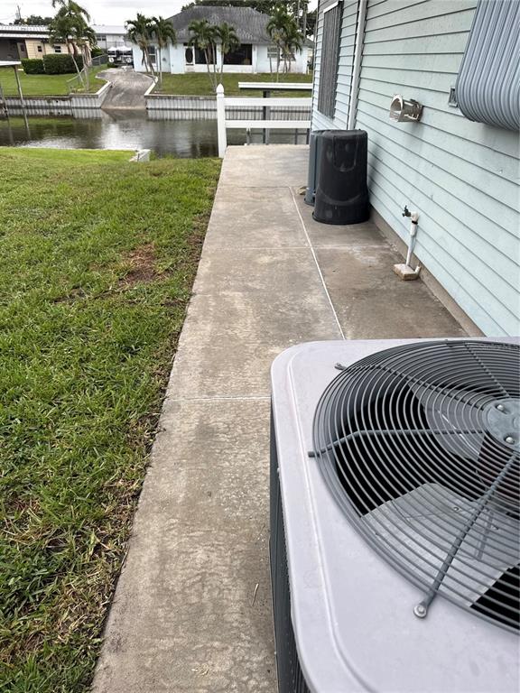 2438 Southeast 32nd Street Okeechobee, FL 34974 - Photo 18 of 42 a view of a swimming pool with a lounge chair