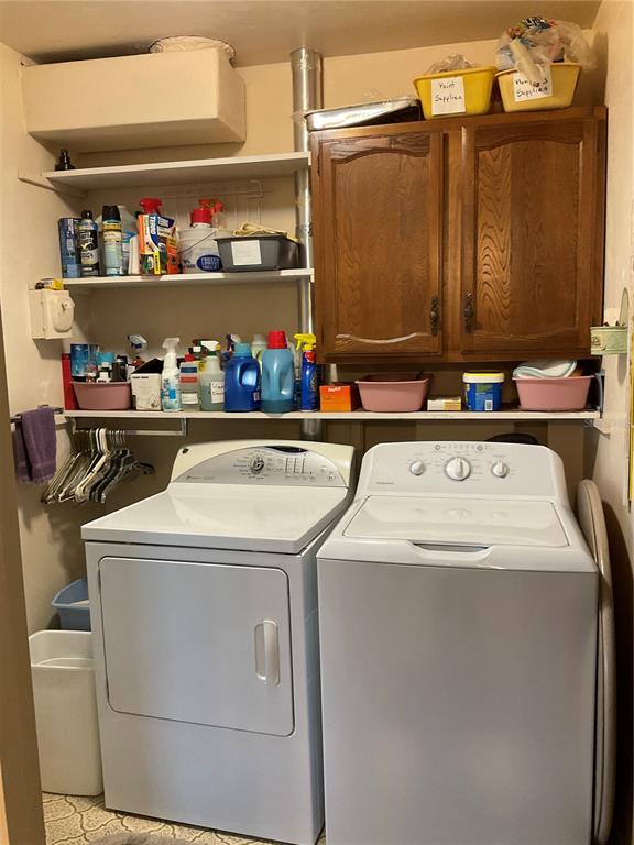 2438 Southeast 32nd Street Okeechobee, FL 34974 - Photo 19 of 42 a utility room with dryer and washer