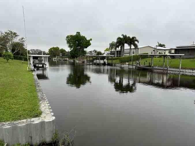 2438 Southeast 32nd Street Okeechobee, FL 34974 - Photo 33 of 42 a view of a lake with houses