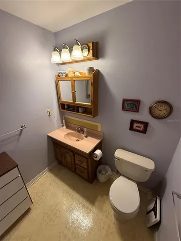 a room with furniture and a chair