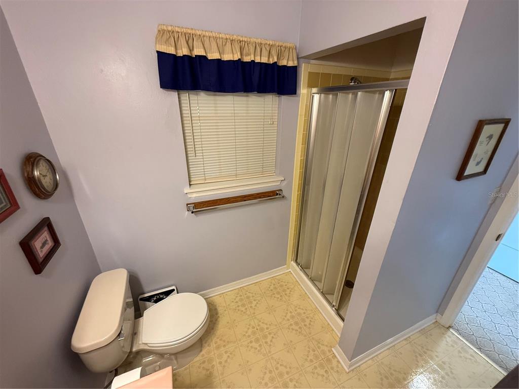 2438 Southeast 32nd Street Okeechobee, FL 34974 - Photo 35 of 42 a bathroom with a sink and a mirror