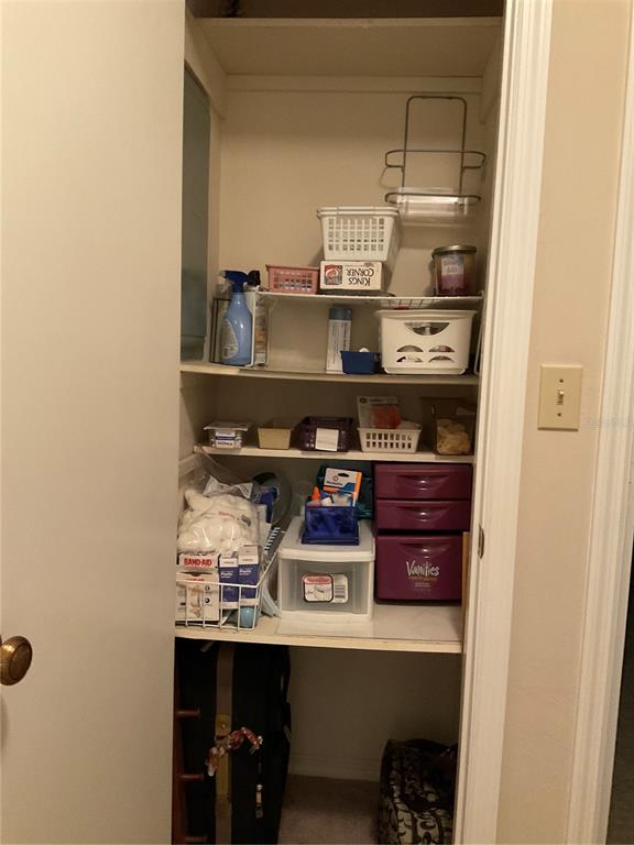 2438 Southeast 32nd Street Okeechobee, FL 34974 - Photo 39 of 42 a room with stainless steel appliances and wooden floor