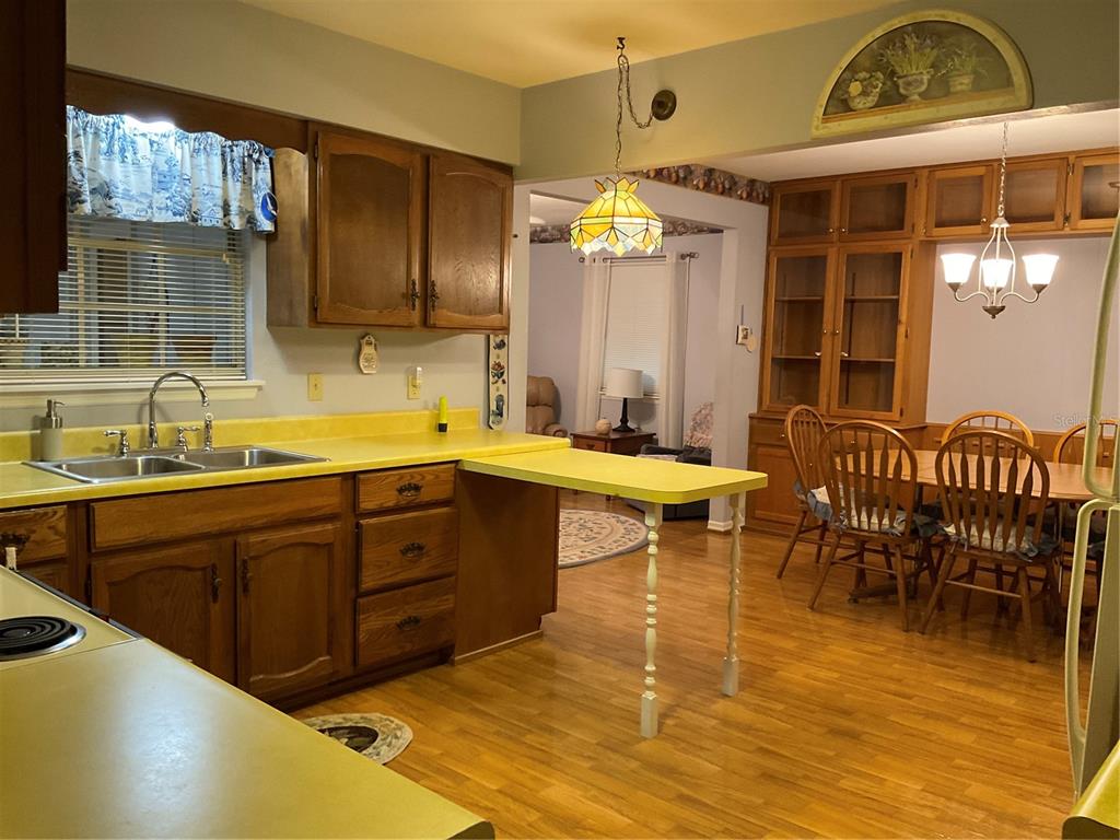 2438 Southeast 32nd Street Okeechobee, FL 34974 - Photo 40 of 42 a bathroom with a sink mirror and a bathtub