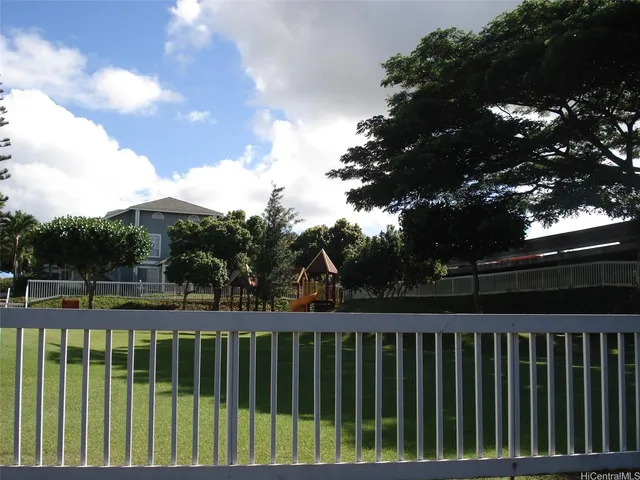 a view of street from a balcony