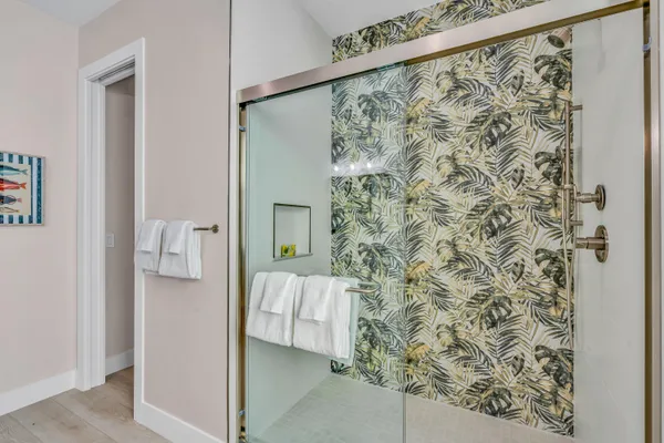 a bathroom with mirror sink and vanity