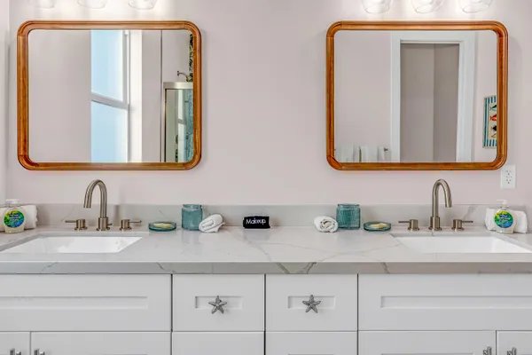 a view of a brick building next to a yard