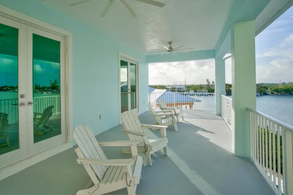 a balcony with furniture