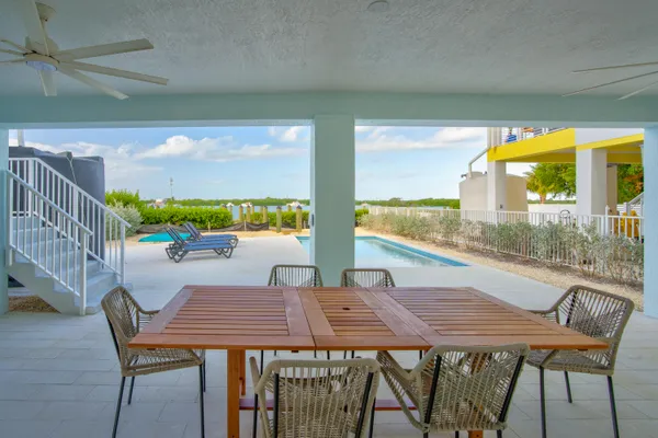 a view of swimming pool from a balcony