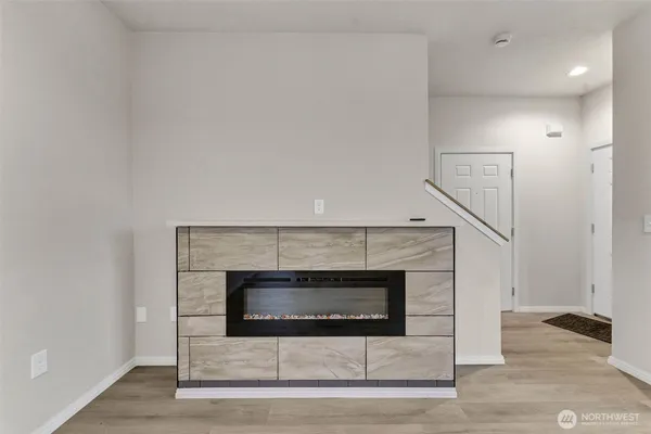 a living room with a fireplace