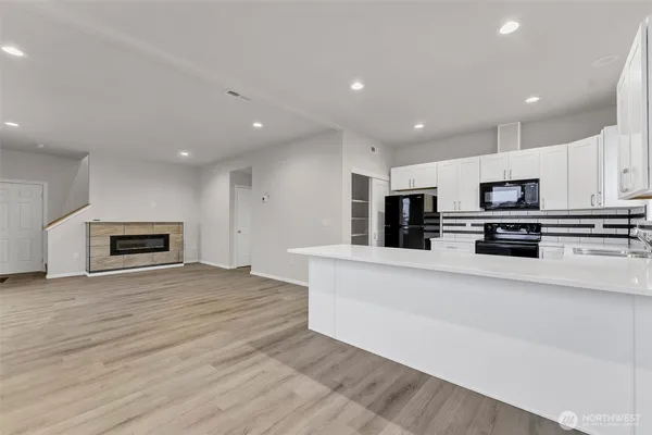 a living room with a fireplace