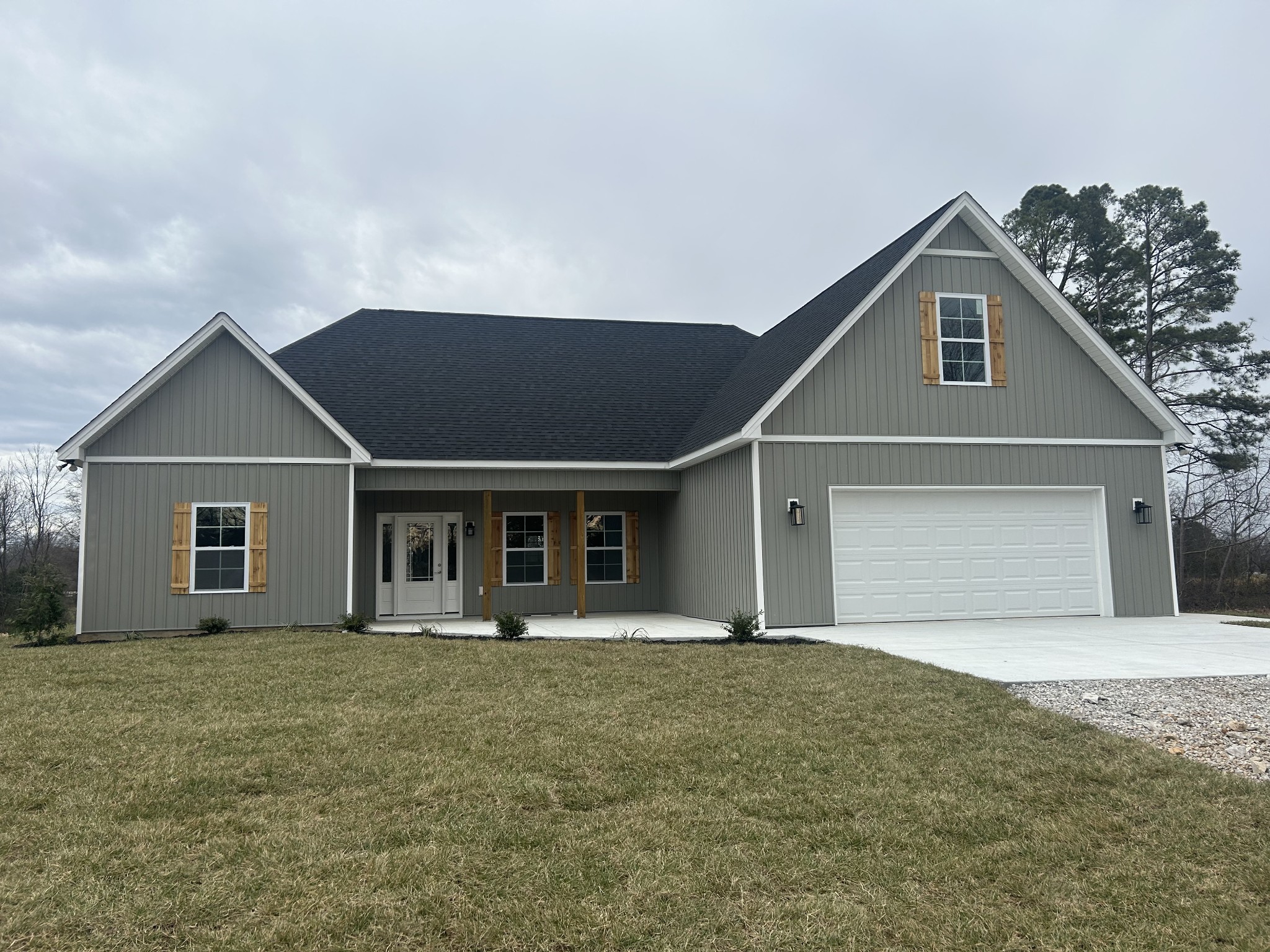 50 Aedc Lakeview Road Estill Springs, TN 37330 - Photo 1 of 25 a front view of house with yard and trees in the background