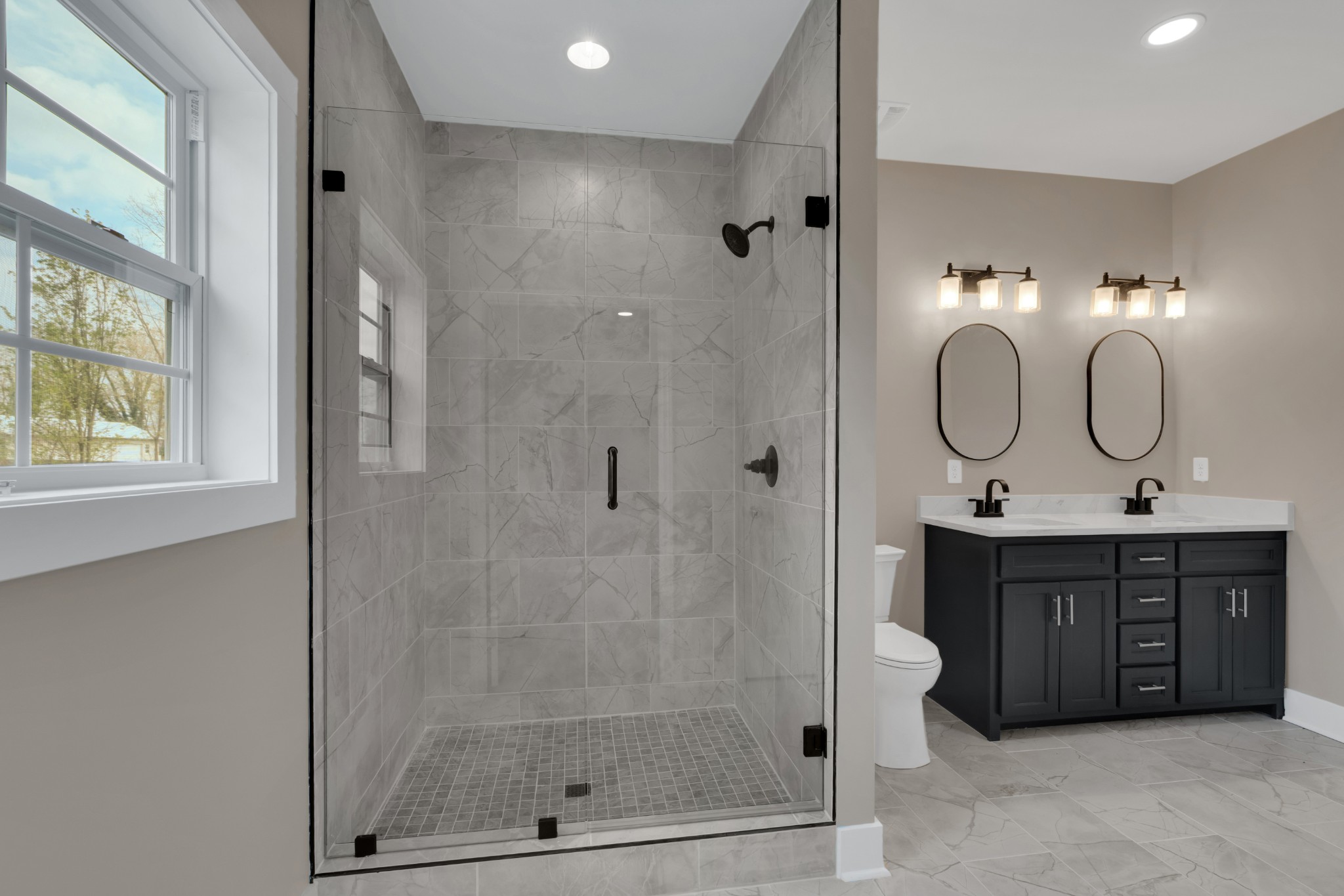 50 Aedc Lakeview Road Estill Springs, TN 37330 - Photo 11 of 22 a bathroom with a mirror a double vanity sink and a mirror