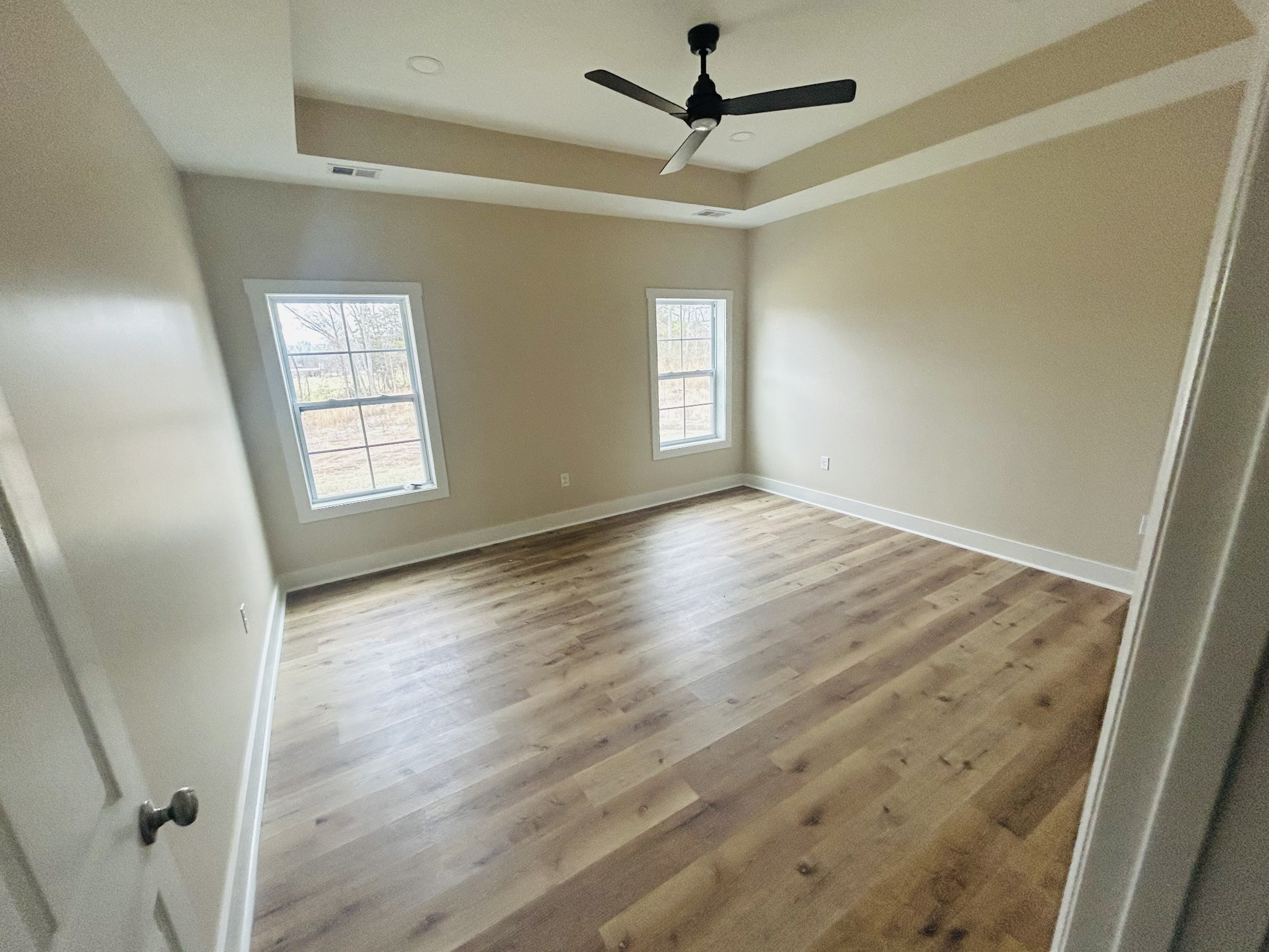 50 Aedc Lakeview Road Estill Springs, TN 37330 - Photo 14 of 25 a view of empty room with wooden floor and fan