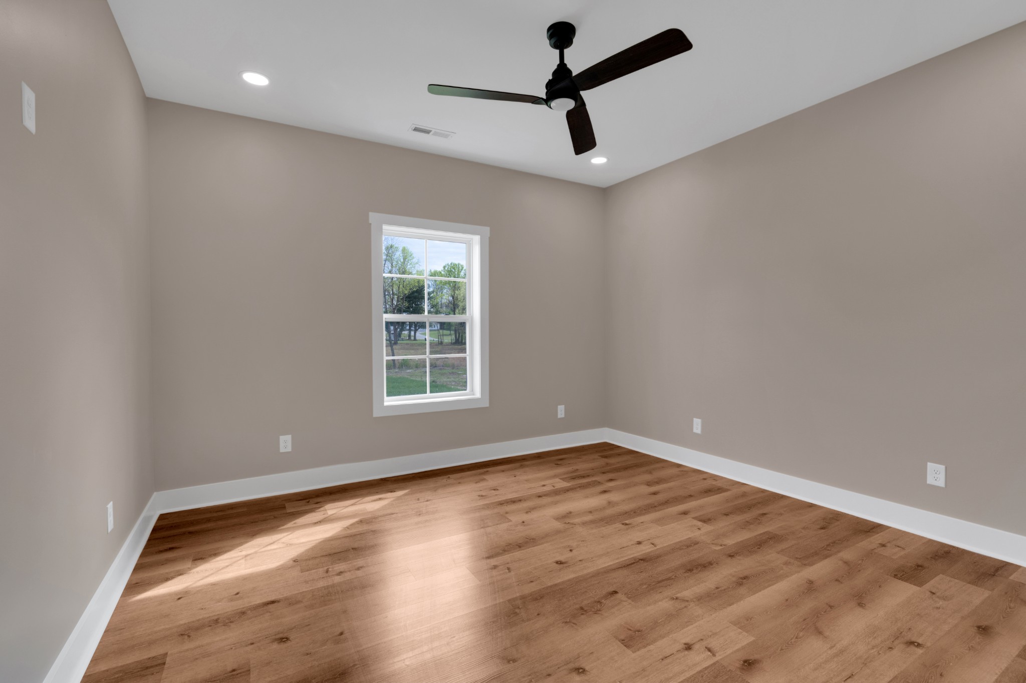 50 Aedc Lakeview Road Estill Springs, TN 37330 - Photo 14 of 22 wooden floor in an empty room with a window