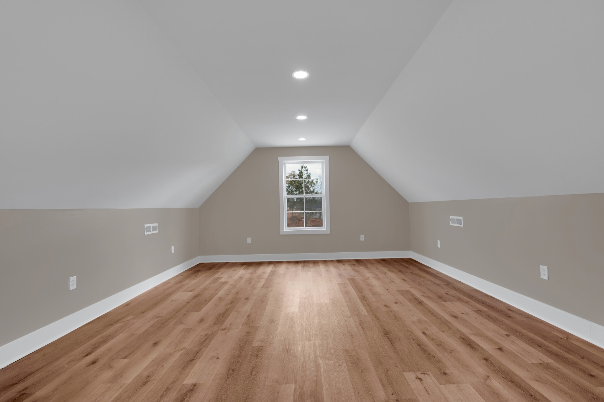 50 Aedc Lakeview Road Estill Springs, TN 37330 - Photo 18 of 22 a view of an empty room with wooden floor and a window