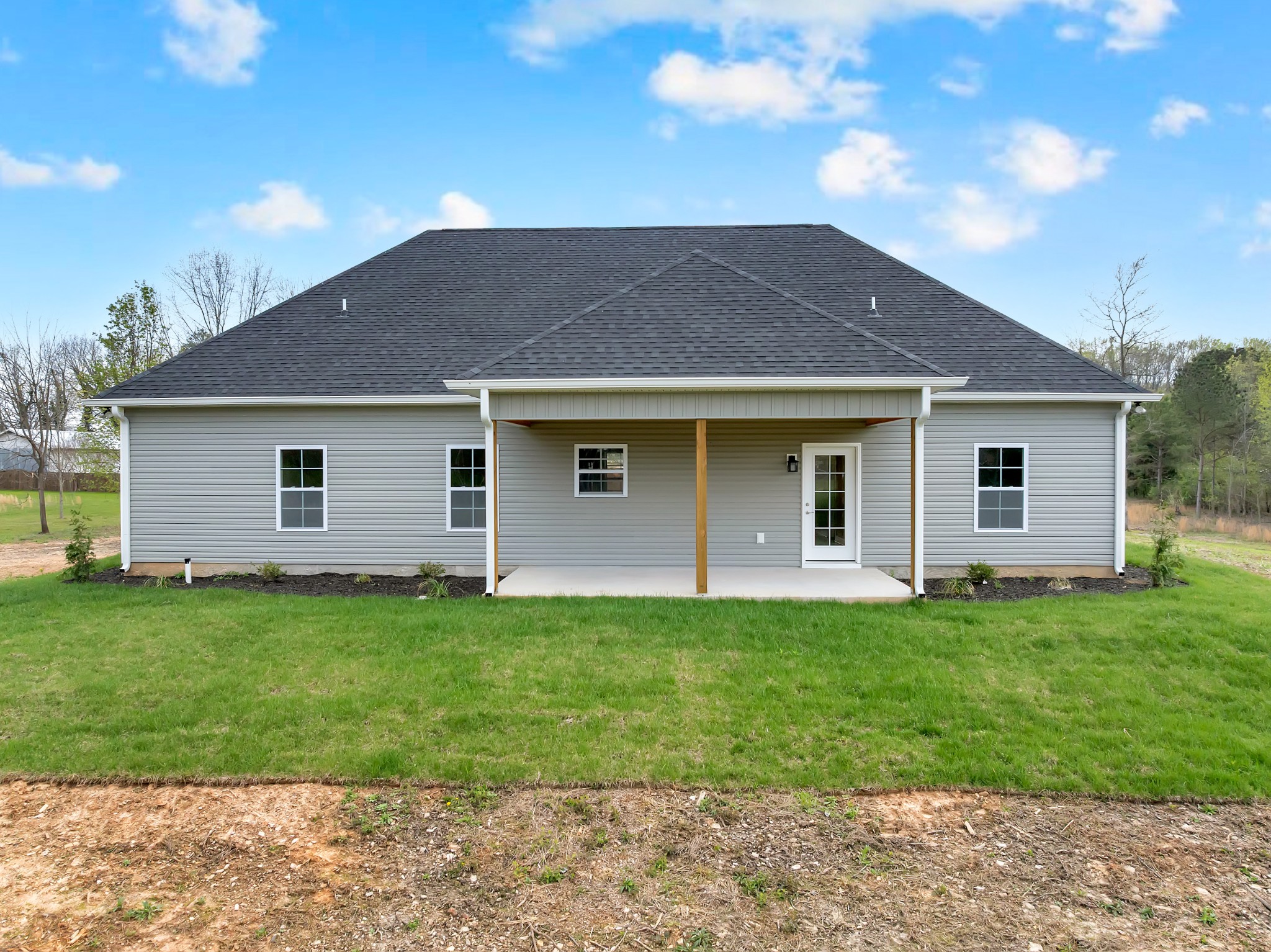50 Aedc Lakeview Road Estill Springs, TN 37330 - Photo 5 of 22 a front view of a house with a garden