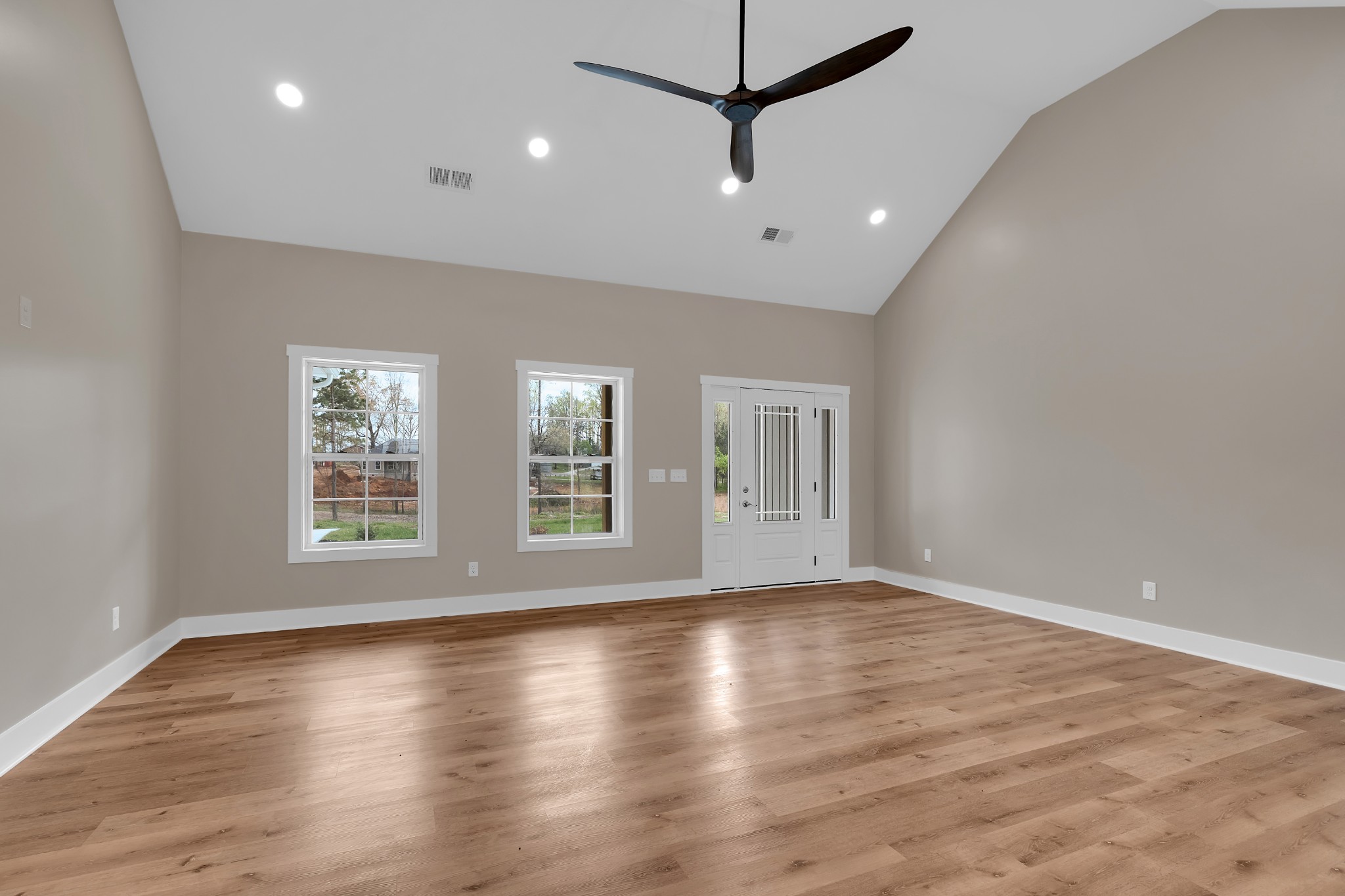 50 Aedc Lakeview Road Estill Springs, TN 37330 - Photo 8 of 22 a view of an empty room with wooden floor and a window
