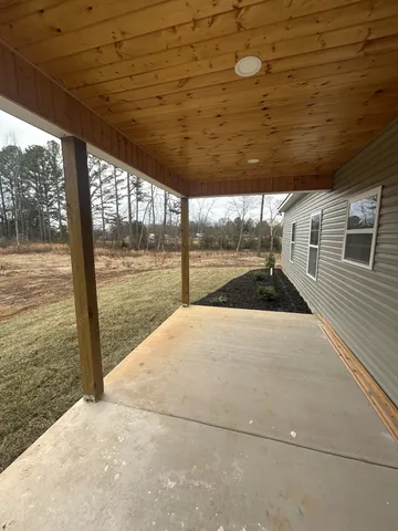 a view of kitchen and wooden floor