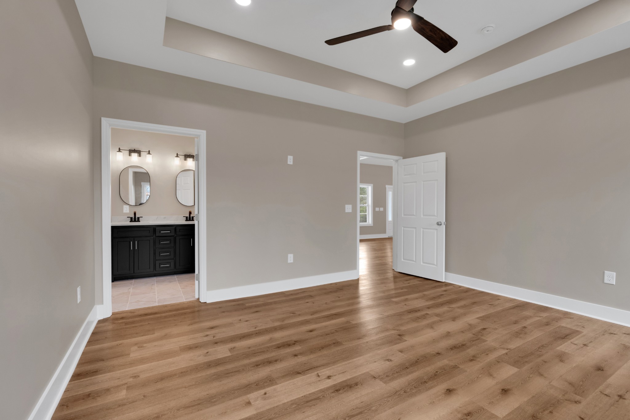 50 Aedc Lakeview Road Estill Springs, TN 37330 - Photo 10 of 22 an empty room with wooden floor and ceiling fan