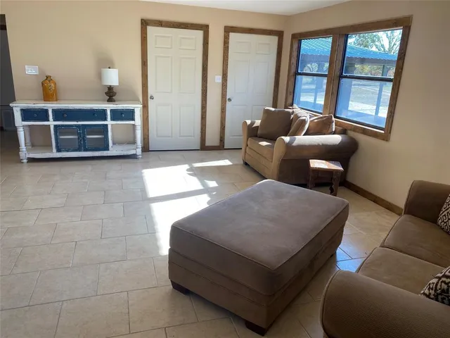 a living room with a couch and a table
