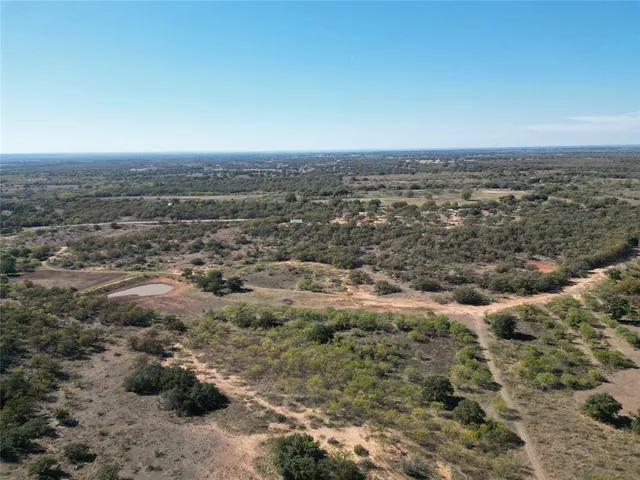 an aerial view of beach and ocean