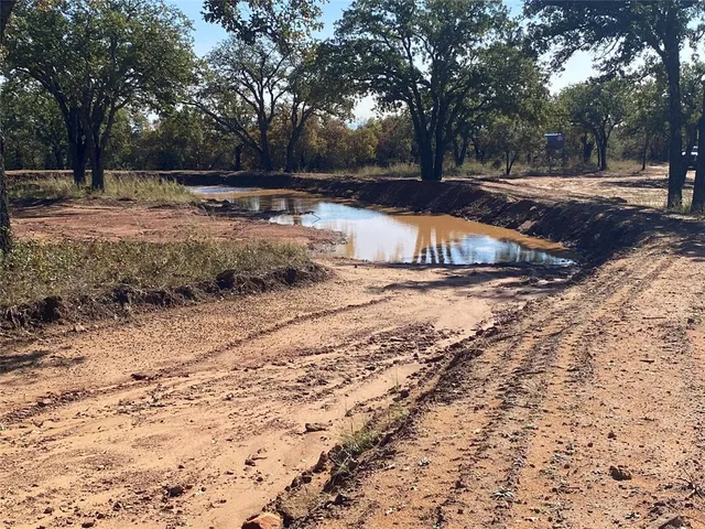 an aerial view of residential house with outdoor space