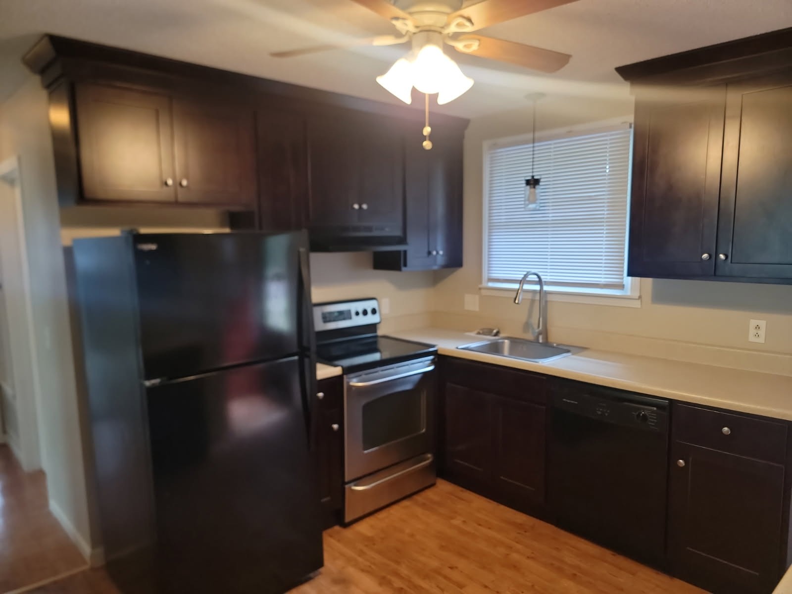 217 Sterling Road, Unit A Hendersonville, TN 37075 - Photo 3 of 8 a kitchen with a sink stainless steel appliances and cabinets