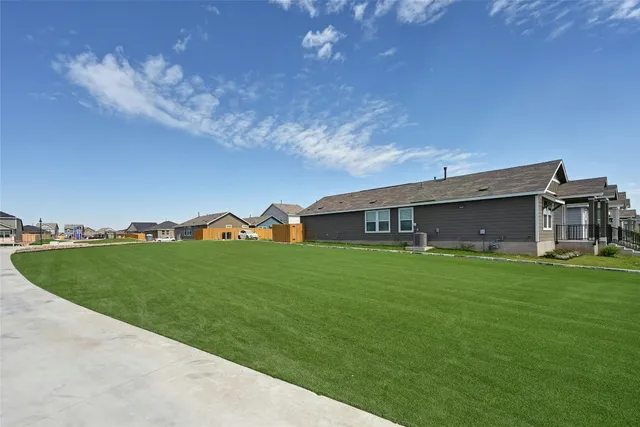 a house view with a garden space