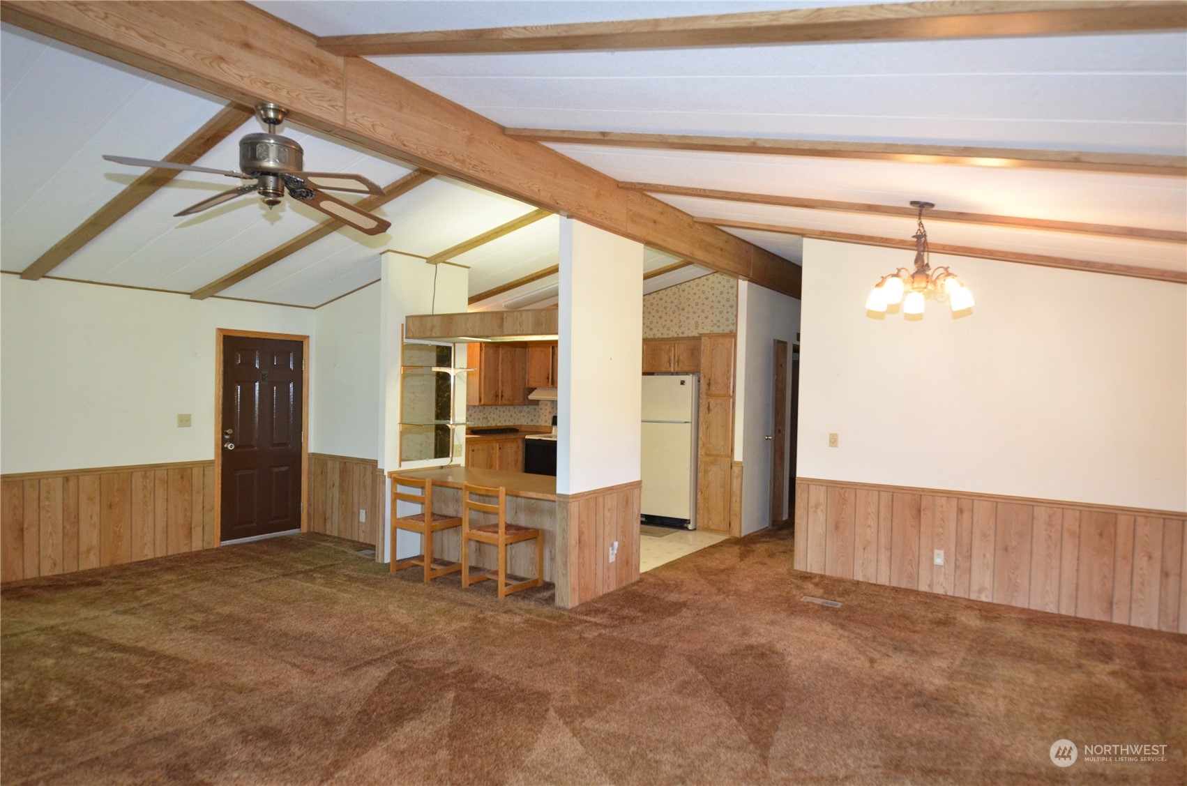 12712 Northeast 199th Street Bothell, WA 98011 - Photo 11 of 21 a view of a room with table and chairs