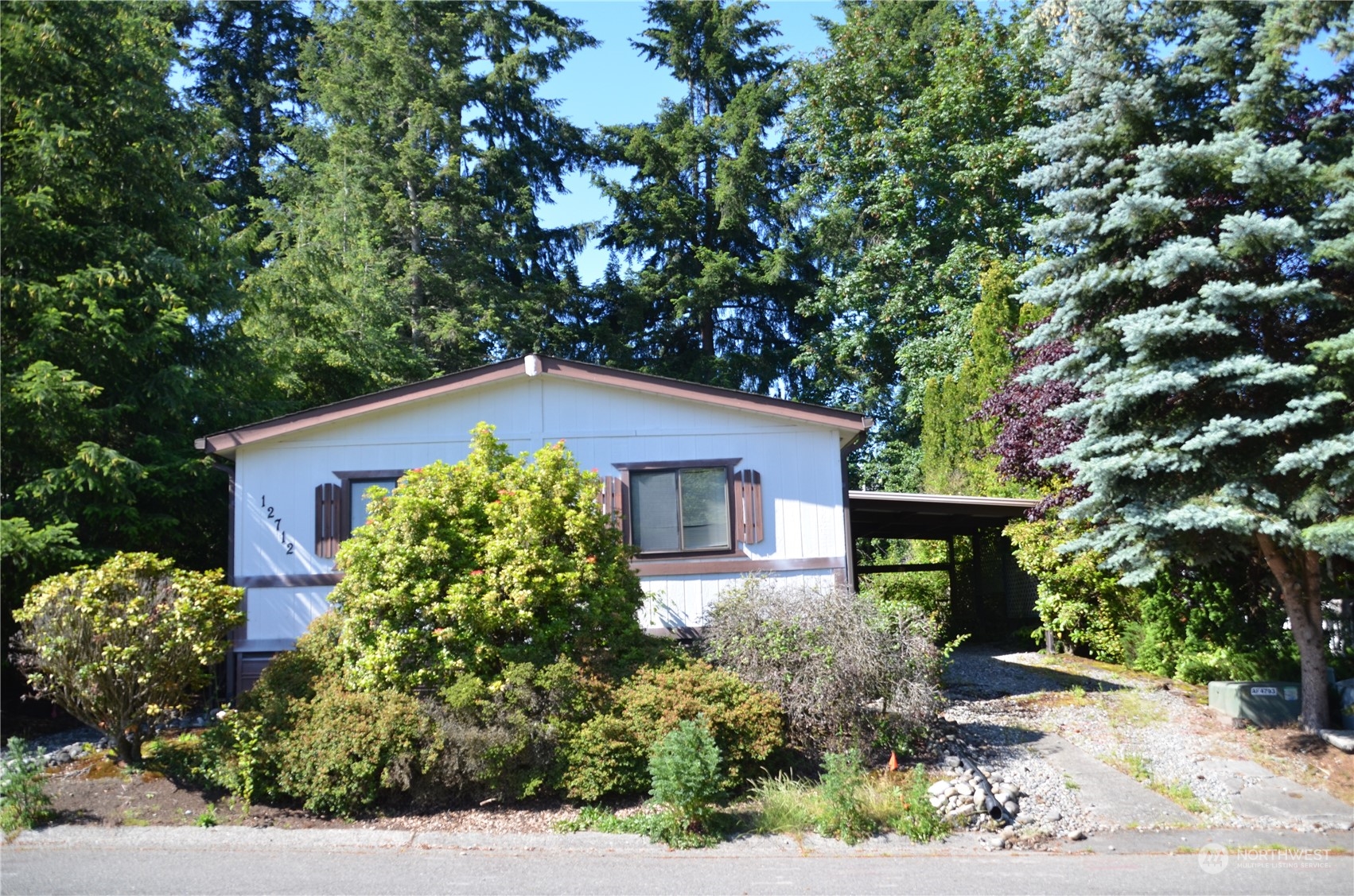 12712 Northeast 199th Street Bothell, WA 98011 - Photo 21 of 21 front view of house with a yard