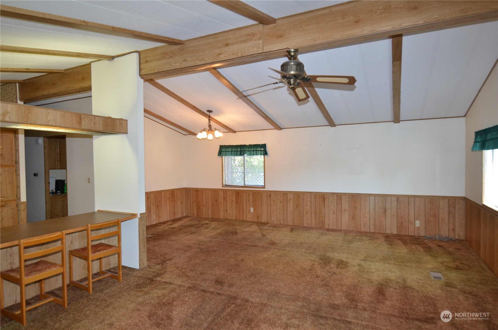 12712 Northeast 199th Street Bothell, WA 98011 - Photo 9 of 21 a view of room with wooden floor