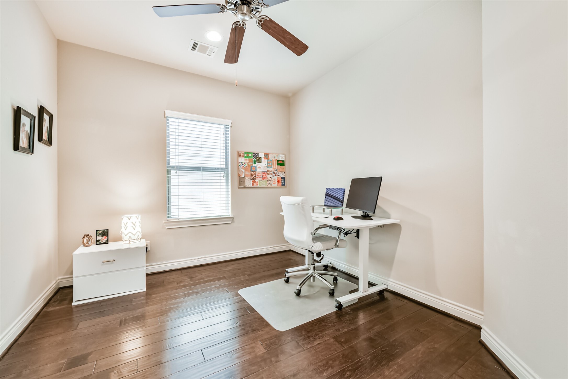1321 Laird Street Houston, TX 77008 - Photo 15 of 25 One of three secondary bedrooms. Currently used as a home office. Great flex space or full fourth bedroom.