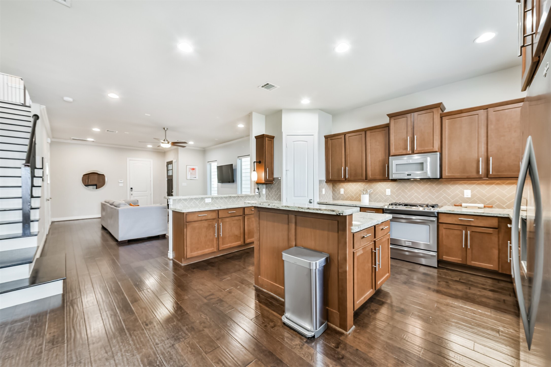 1321 Laird Street Houston, TX 77008 - Photo 8 of 25 Notice the ample counter/cabinet space with addional storage under the island.