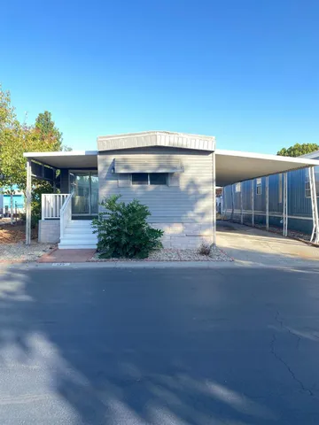 a front view of a house with a garage