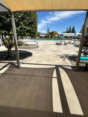 a view of a street with cars