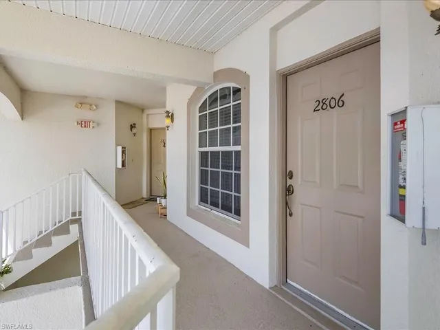a view of entryway with stairs and furniture