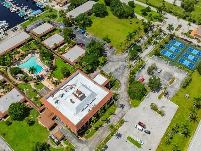 an aerial view of a house with a garden