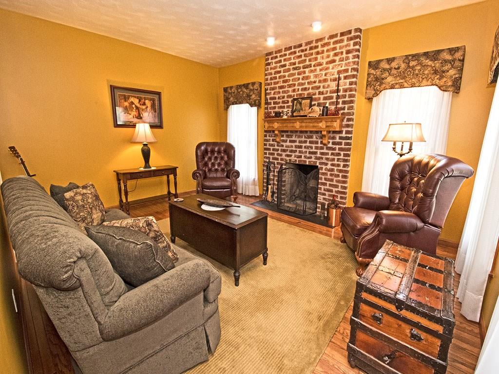 LIVING ROOM WITH HARDWOOD FLOORS AND GAS/WOOD FIREPLACE