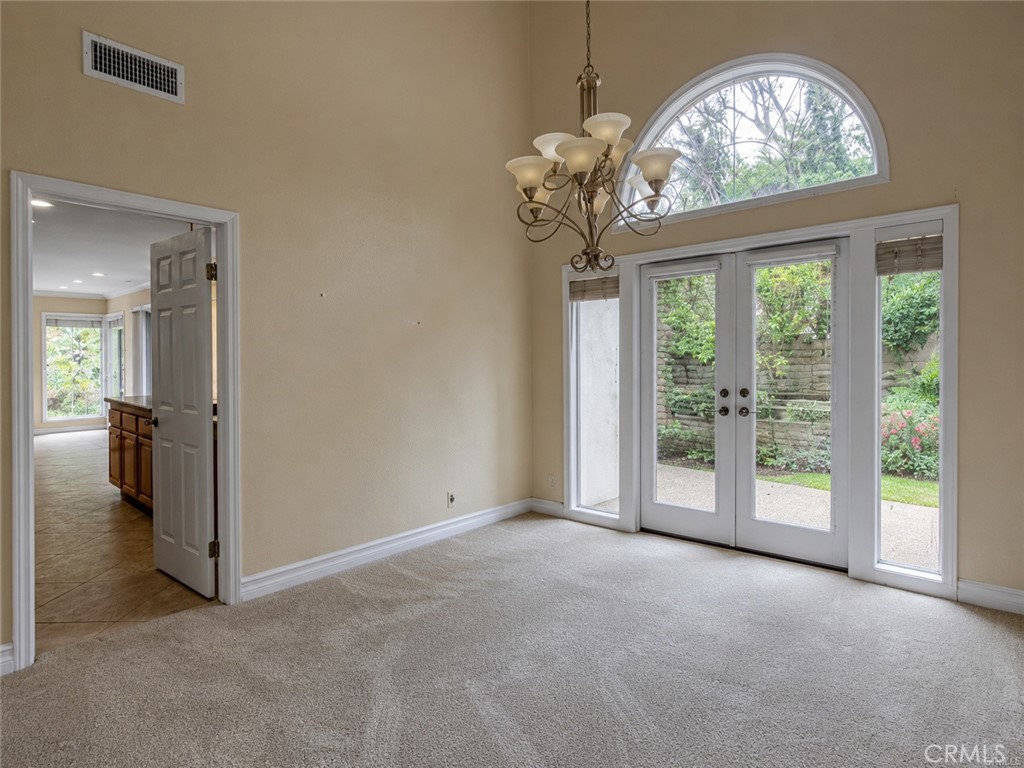 2811 North Roxbury Street Orange, CA 92867 - Photo 4 of 8 wooden floor in an empty room with a window
