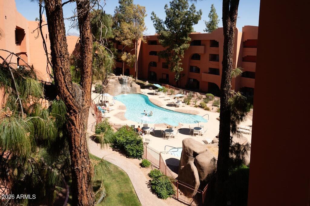 4303 East Cactus Road, Unit 403 Phoenix, AZ 85032 - Photo 26 of 37 a view of outdoor space with seating area