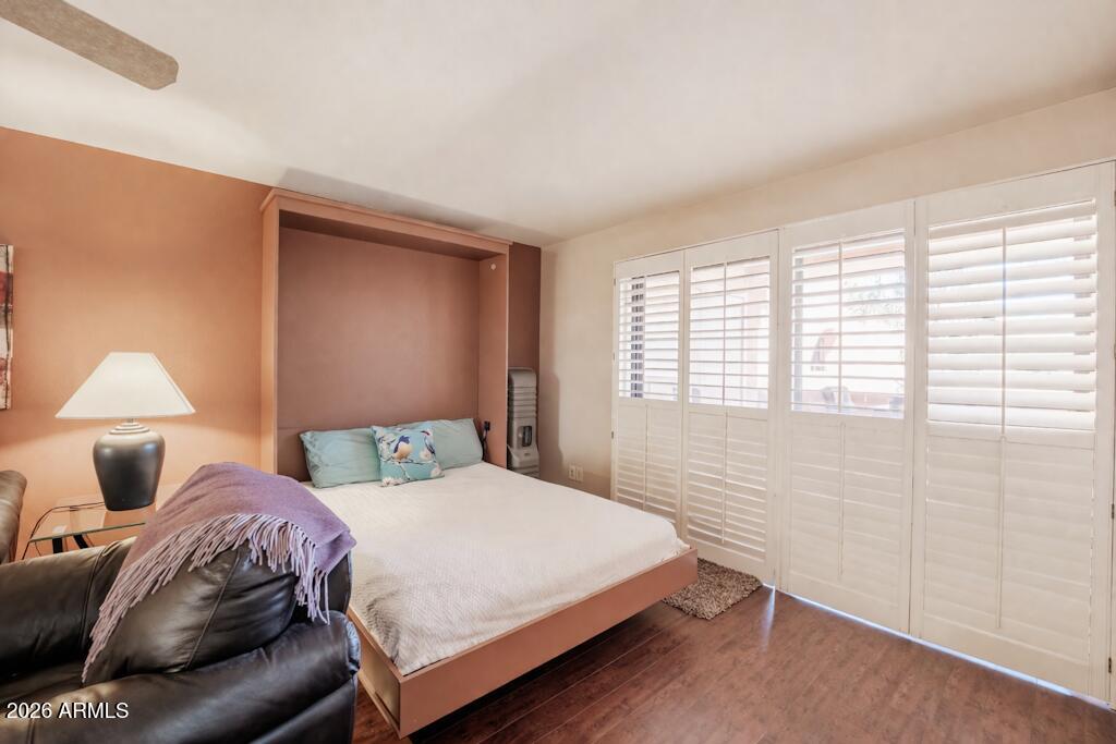 4303 East Cactus Road, Unit 403 Phoenix, AZ 85032 - Photo 6 of 37 a bedroom with a bed and a window
