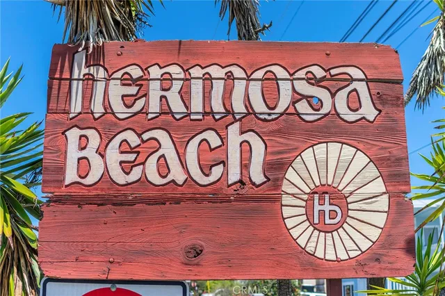 a front view of a building with sign board