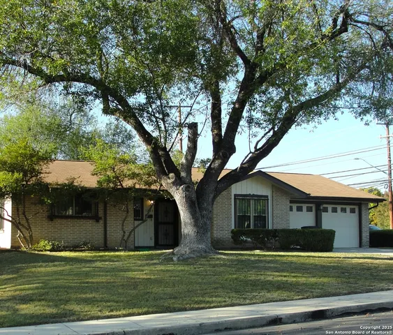 a view of a house with a big yard