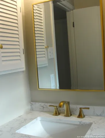 a view of a door and a window