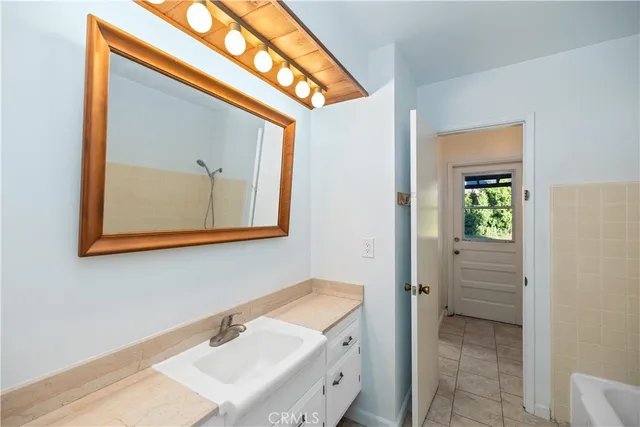 a bathroom with a sink and a toilet