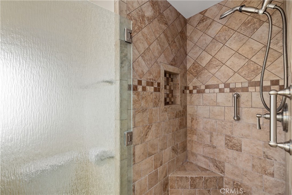 13402 Winthrope Street North Tustin, CA 92705 - Photo 23 of 34 a bathroom with a shower