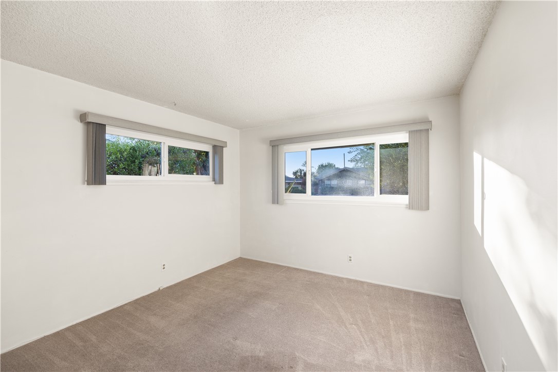13402 Winthrope Street North Tustin, CA 92705 - Photo 26 of 34 an empty room with windows