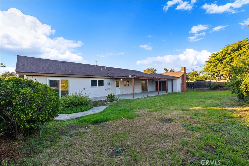 13402 Winthrope Street North Tustin, CA 92705 - Photo 31 of 34 a view of a house with a yard